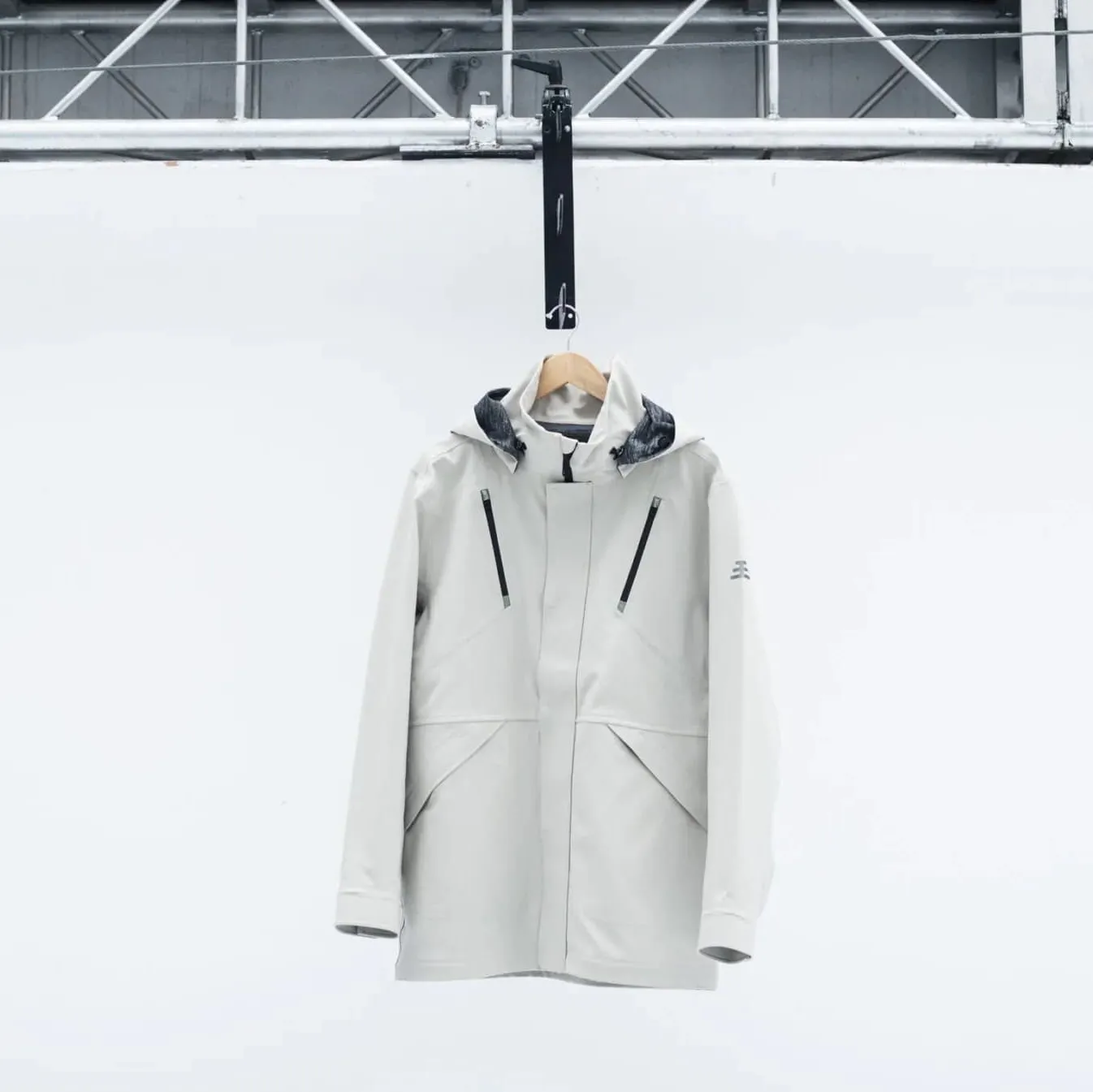 Ulterior hardshell hanging in a quiet brand setting